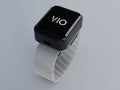 VIO on a WHOOP band, seen from the front, the screen showing the VIO wordmark. Rendered from the CAD model, not a photo.