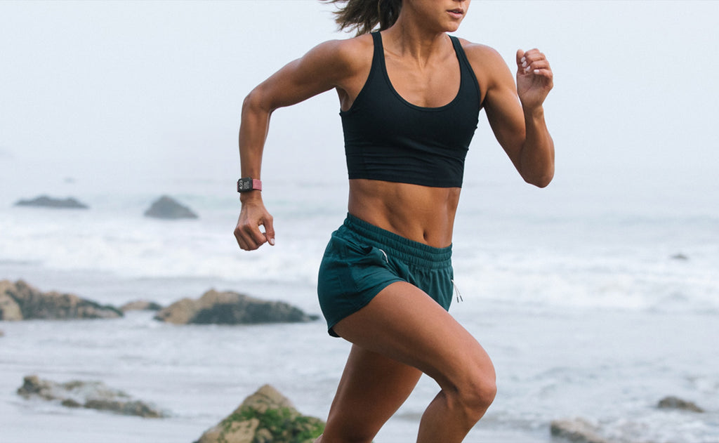 A runner by the sea wearing VIO. Generated with AI, not a photograph.